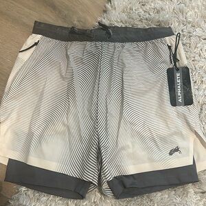 Brand New w/tags Men Alphalete Shorts with liner. Size M